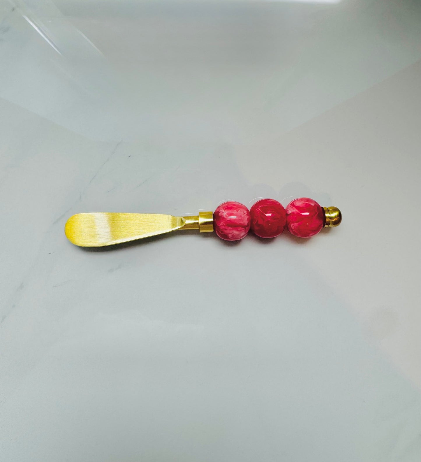 Red Marble Spreader